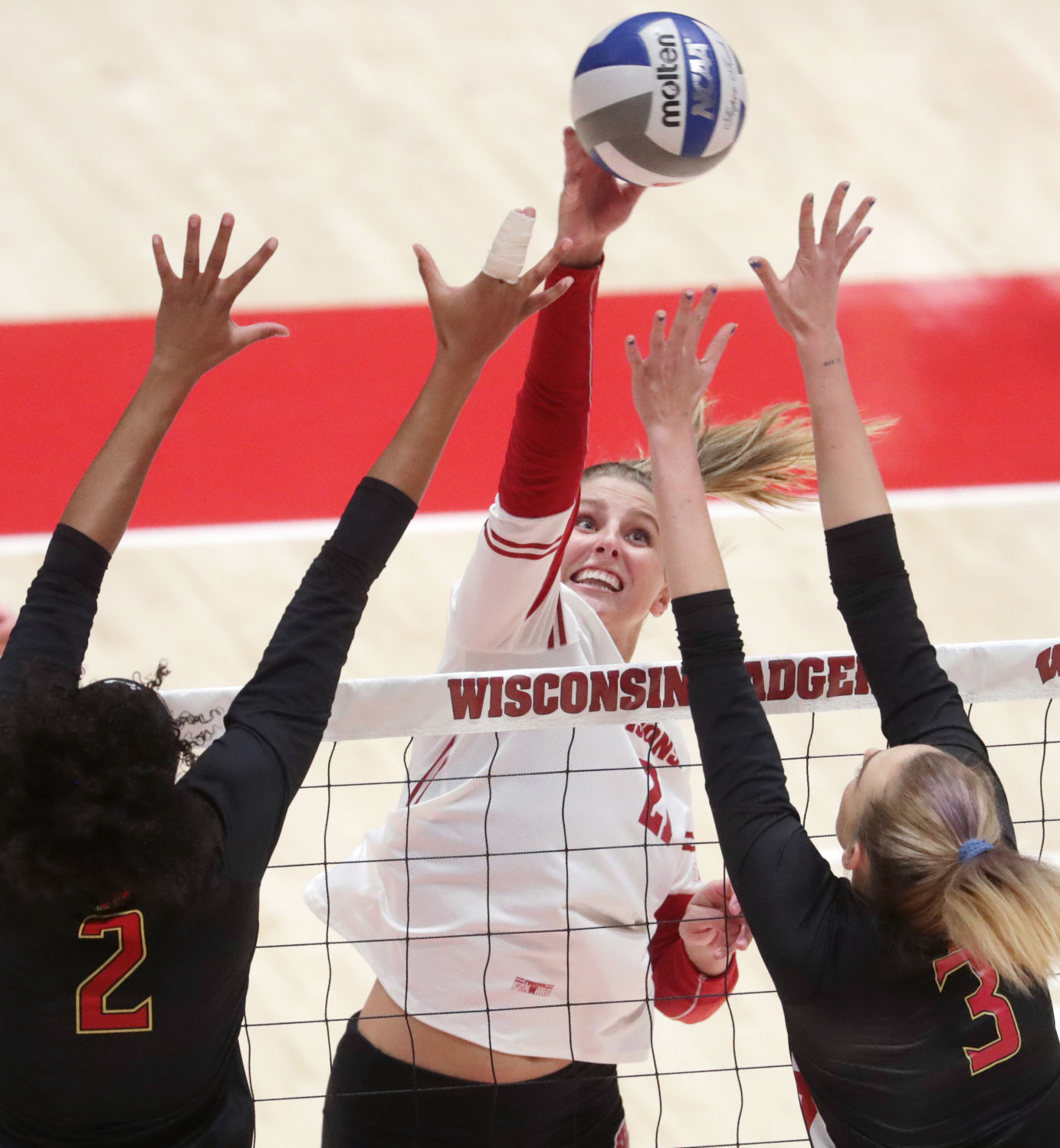 Wisconsin competes against Maryland in a women's volleyball match at the UW Field House